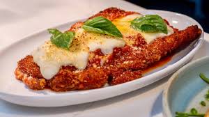 Radici Wood Fired Grill signature dishes Wood Fired Pork Chop, Chicken Parmesan, Lasagna Bolognese, Tiramisu